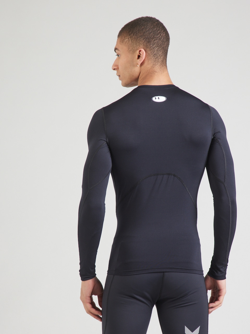 UNDER ARMOUR Maglia Funzionale: Performance e Comfort